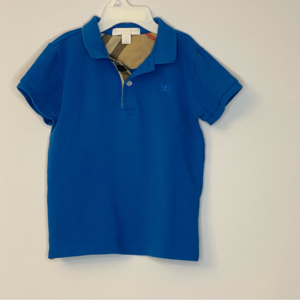 Burberry Children Polo Size 5Y classic plaid on placket. Like new. Blue